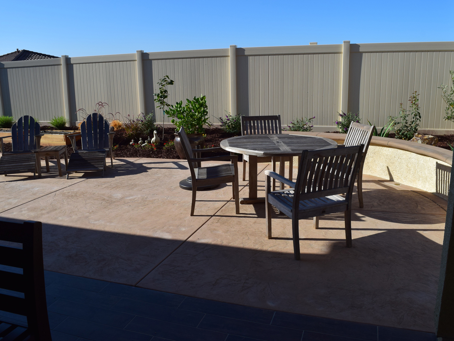 Concrete patio with sitting wall in Temecula McCabe's Landscape Construction