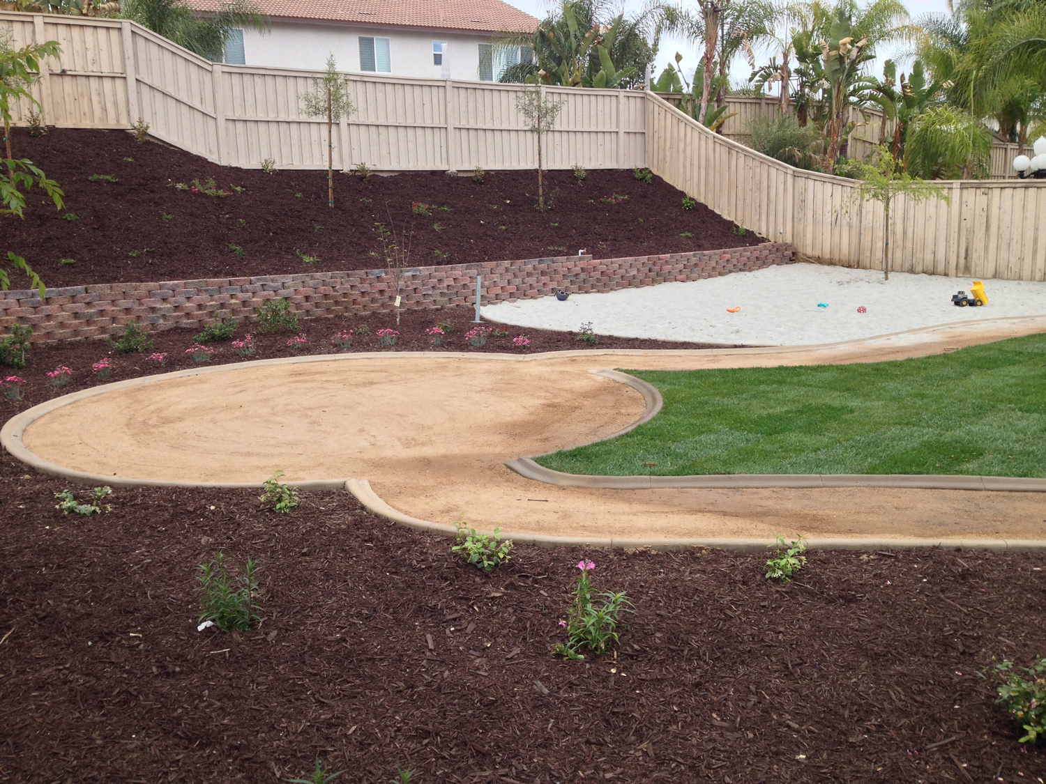DG patio and pathways with grass and sand in Lake Elsinore McCabe's Landscape Construction