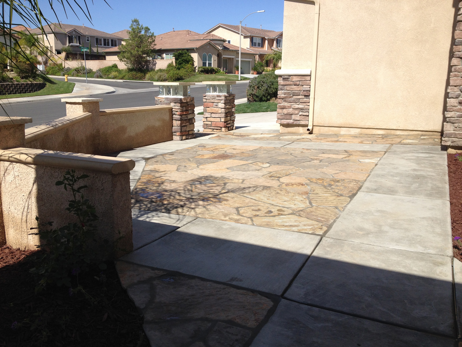 Flagstone courtyard with walls in Murrieta McCabe's Landscape Construction