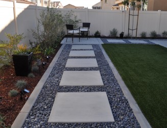 Modern concrete squares with Mexican beach pebbles in Temecula McCabe's Landscape Construction