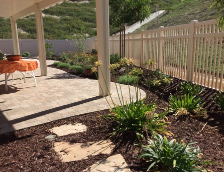 Paver patio with alumawood patio cover in Winchester McCabe's Landscape Construction