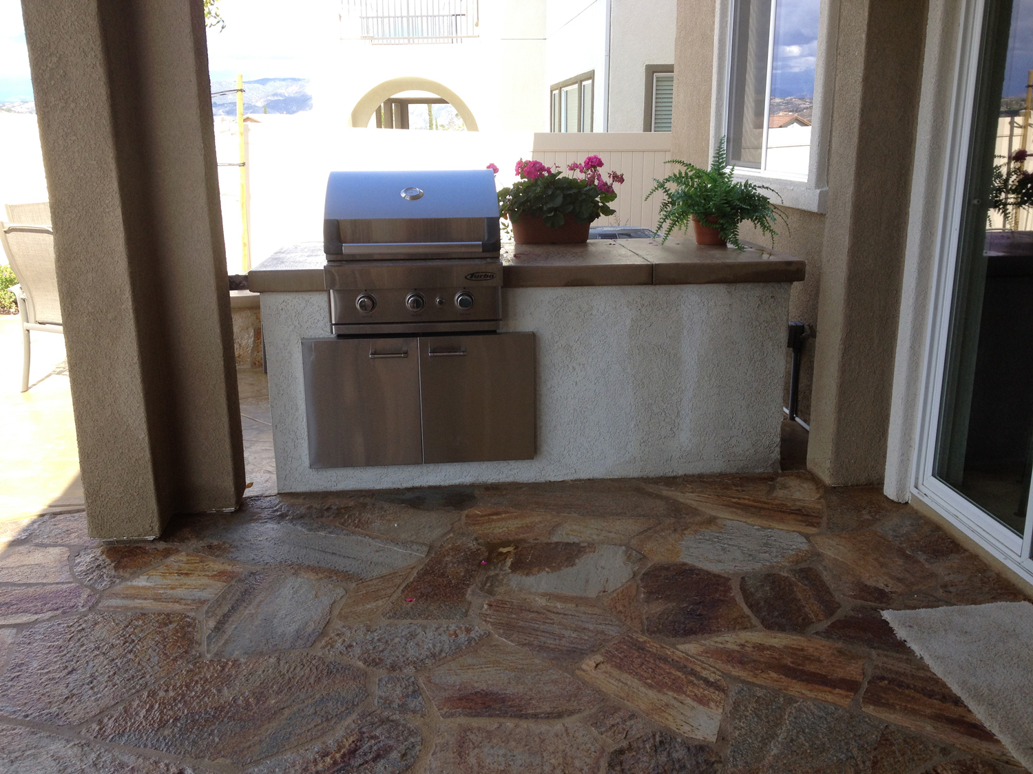 Flagstone patio with built in BBQ in Temecula McCabe's Landscape Construction