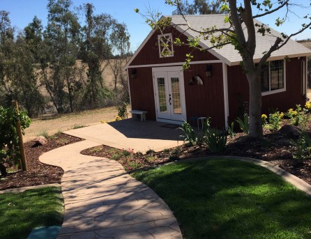 Barn with concrete sitting area in Wine Country Temecula McCabe's Landscape Construction