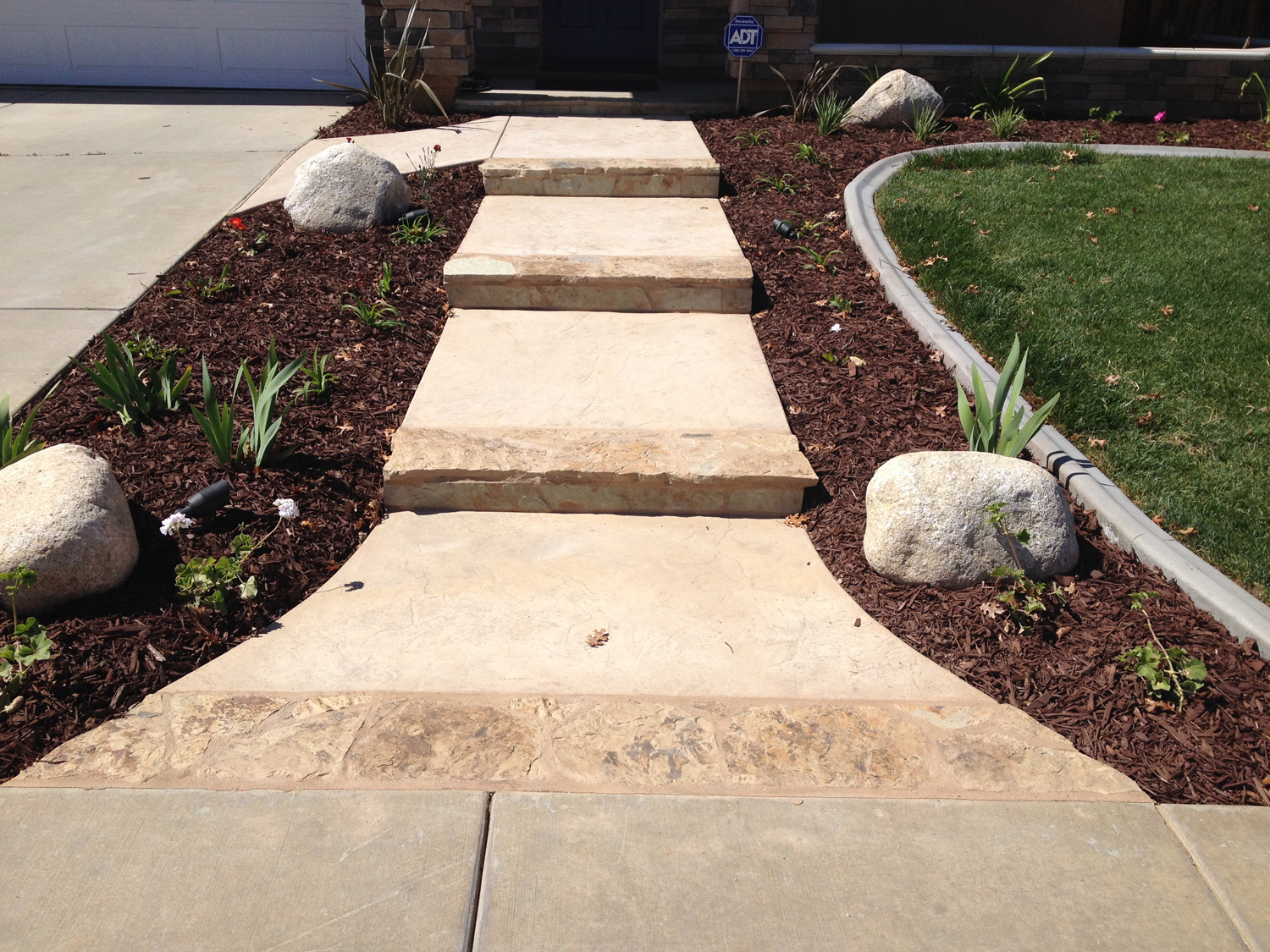Flagstone edged steps by McCabe's Landscape Construction