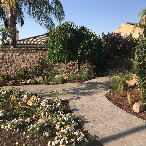 Landscape pathway made of interlocking concrete pavers