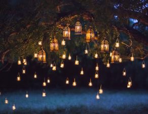 Night garden with lights and lanterns