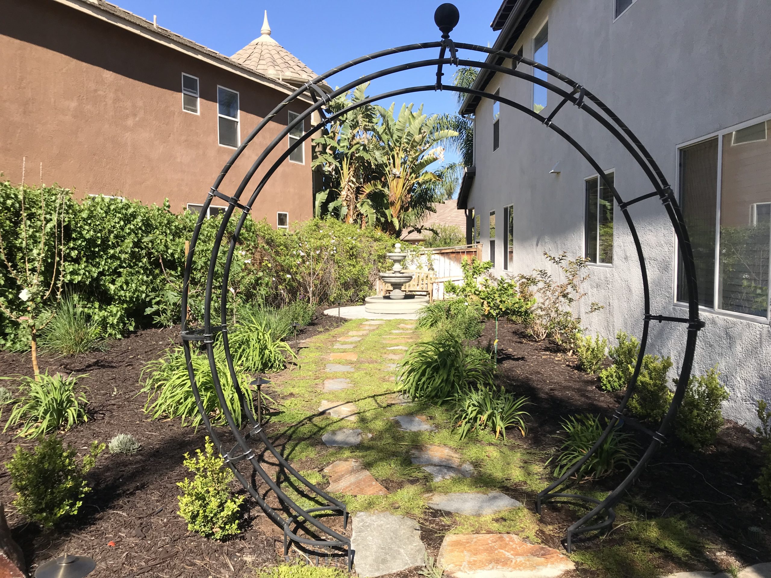 Moon gate - Garden archway into a seating area